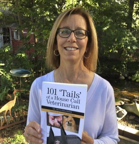 Dr. Krausman with her book, 101 ‘Tails’ of a House Call Veterinarian