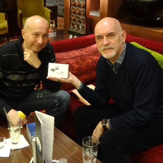 Neuronium Michel Huygen (Neuronium, right side) receives his midiBeam from Gabor (pandaMidi, left side) at the lobby of Marriott, Budapest.