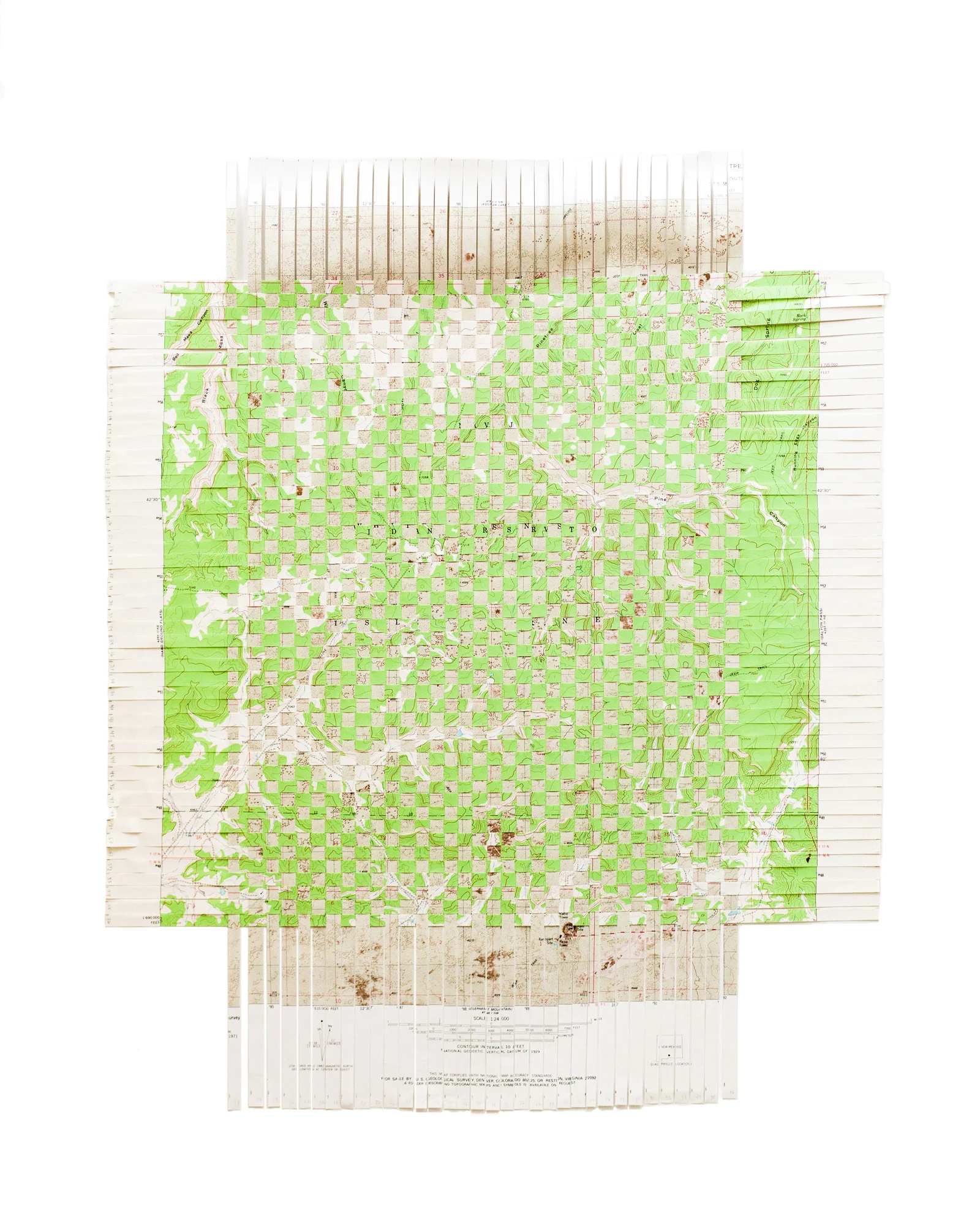 Land Weaving I , 2015, 22" x 27" Combines a USGS map of the Navajo Indian Reservation with a USGS map of the White Sands Missile Range, New Mexico. 