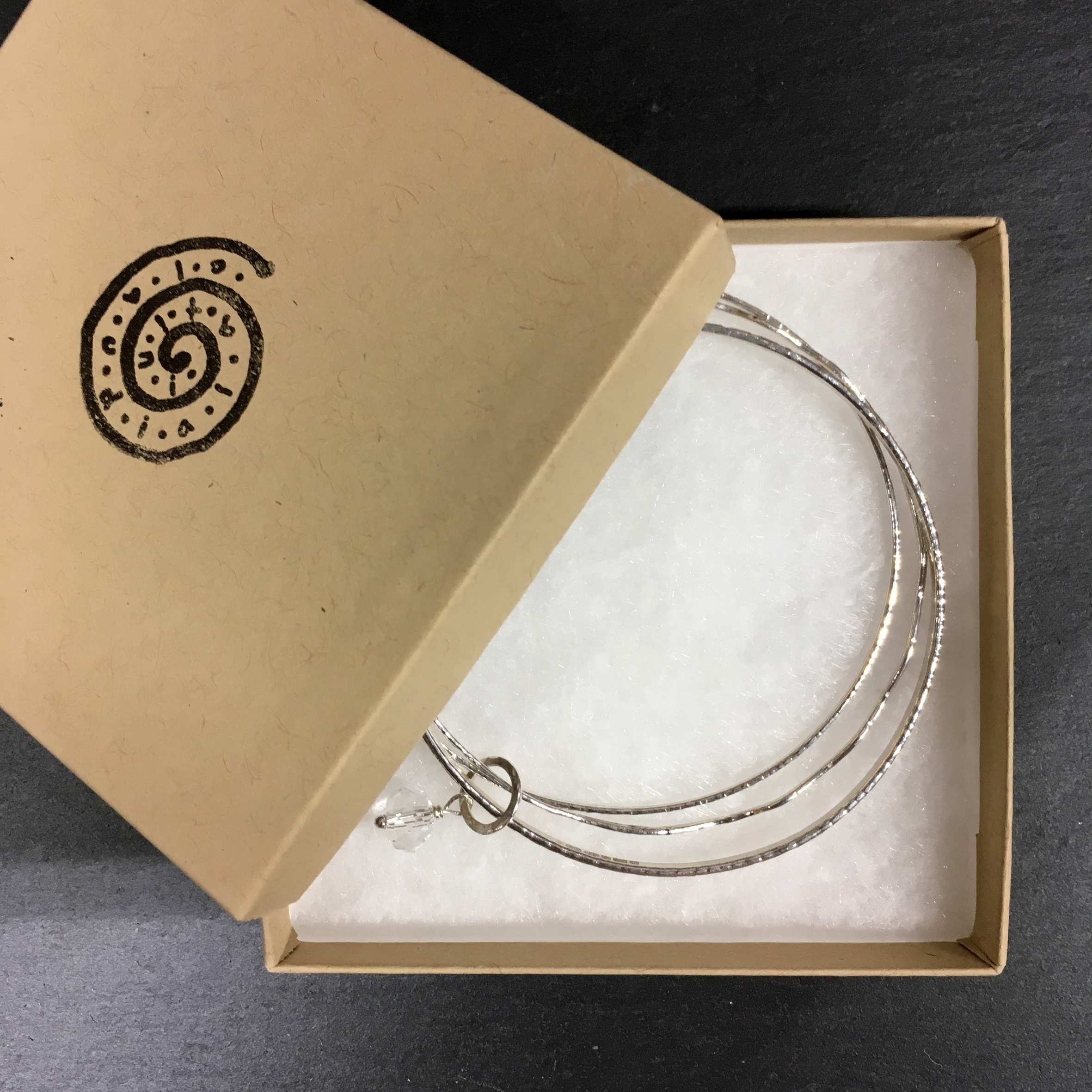 3 interlinked bracelets:crystal boxed.jpg