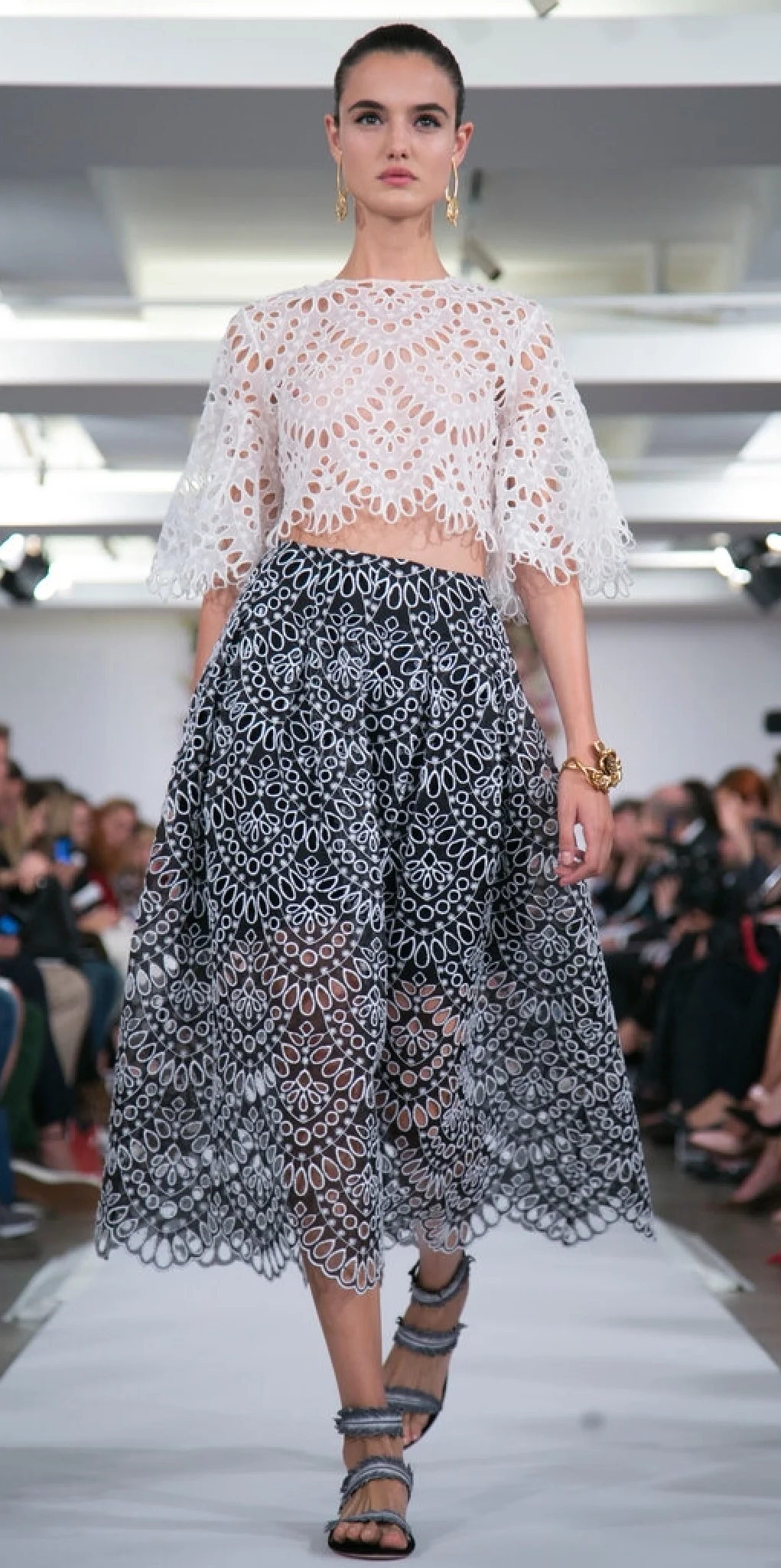 Patterned eyelet lace on top and bottom gives an allover transparent feel to these pieces. (Oscar de la Renta)