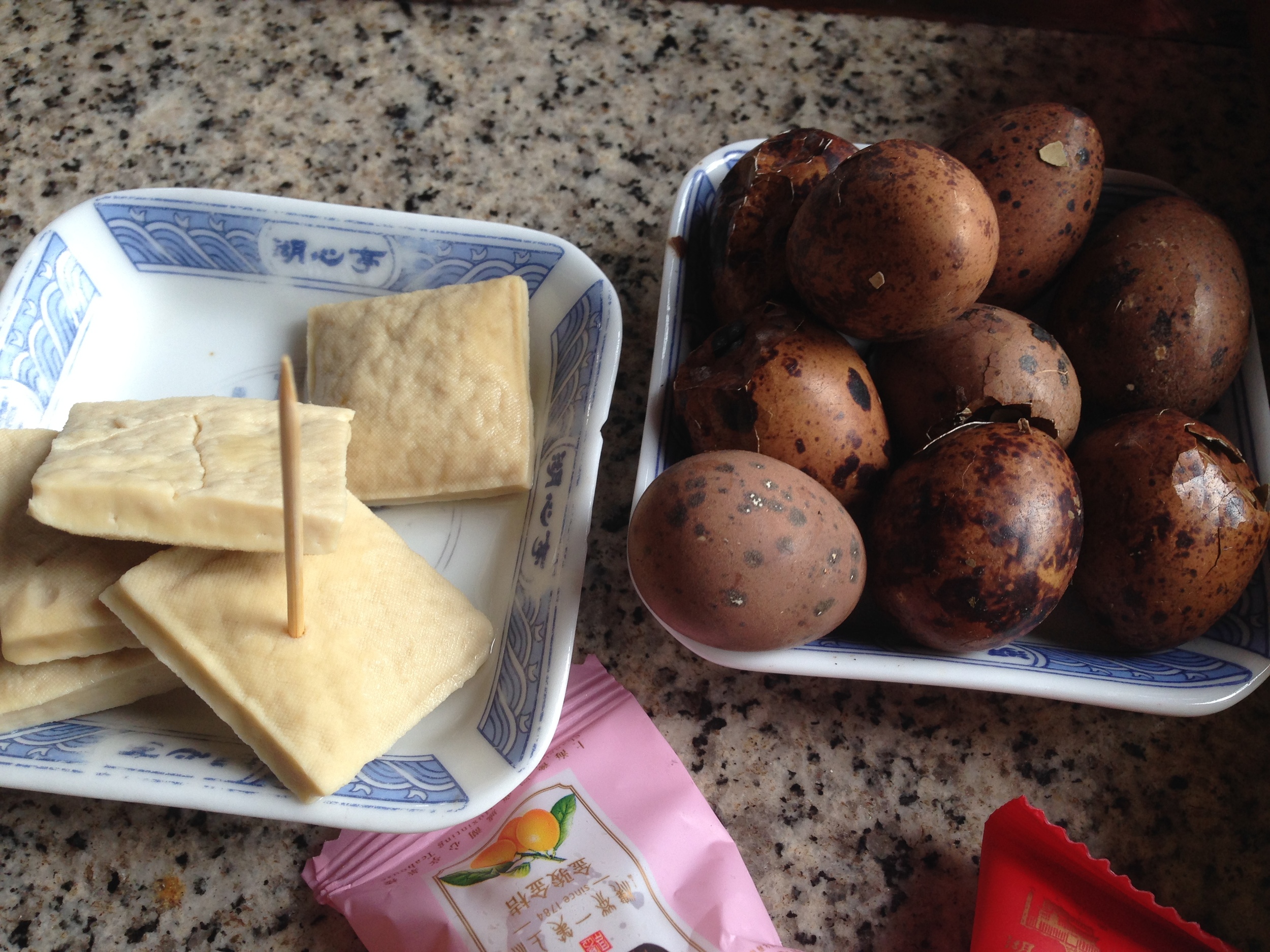 Tofu, and marinated in tea duck eggs. 