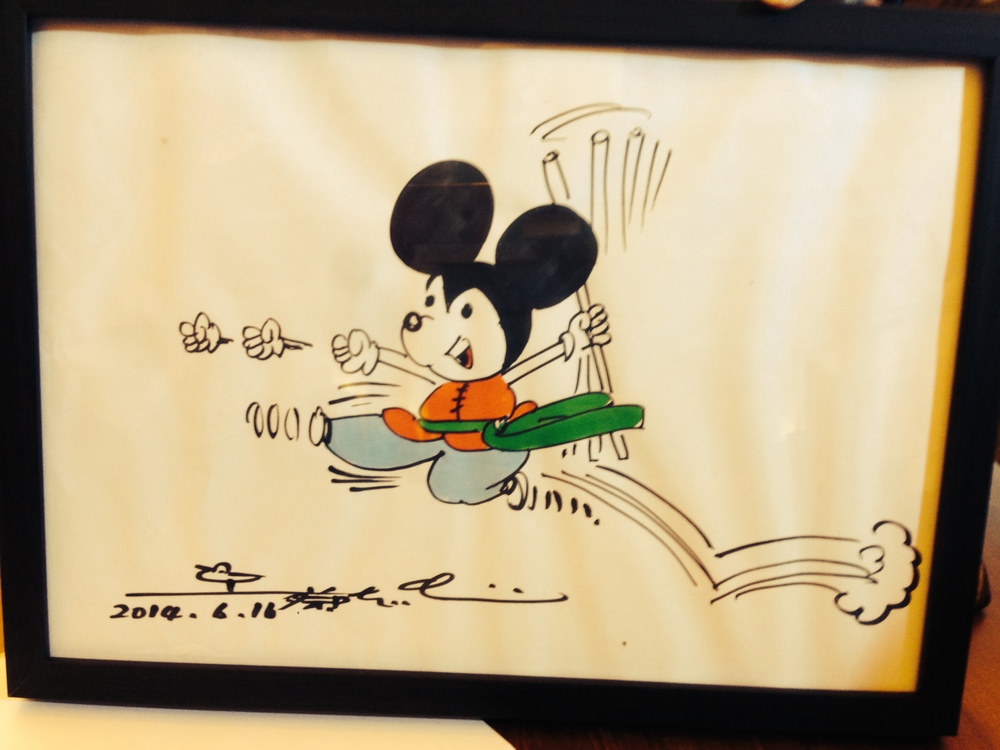 No, not the winner, this is by our judge Tsai, Chin Chung's Mickey, drawn on camera and given as a prize to lucky contest winners.