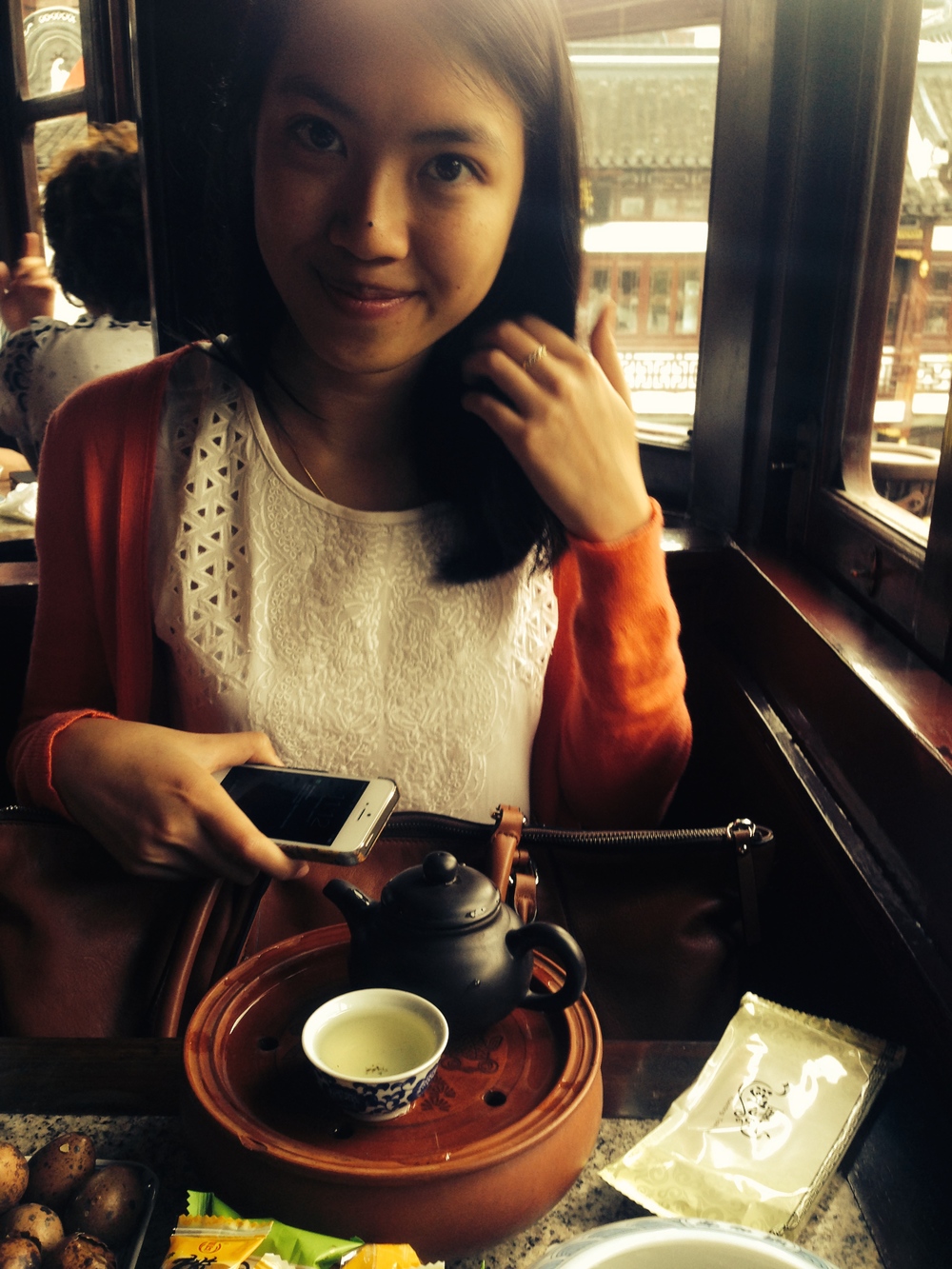 Vanessa in the Tea House for tea time while it gently rained outside.