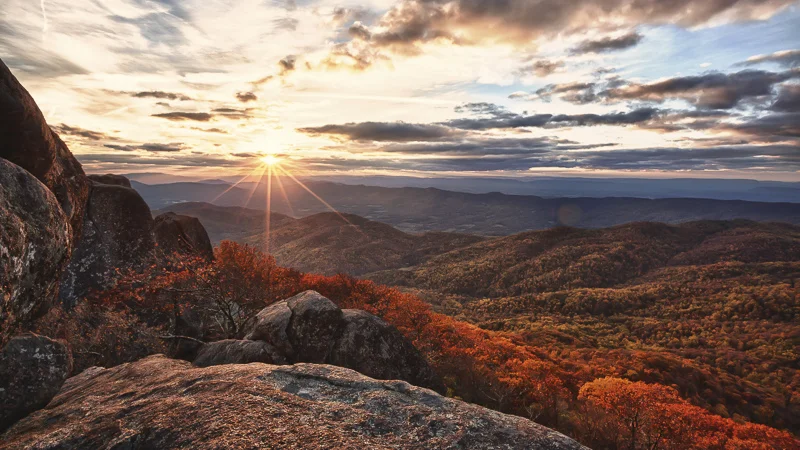Autumn sunset on top of mountain landscape