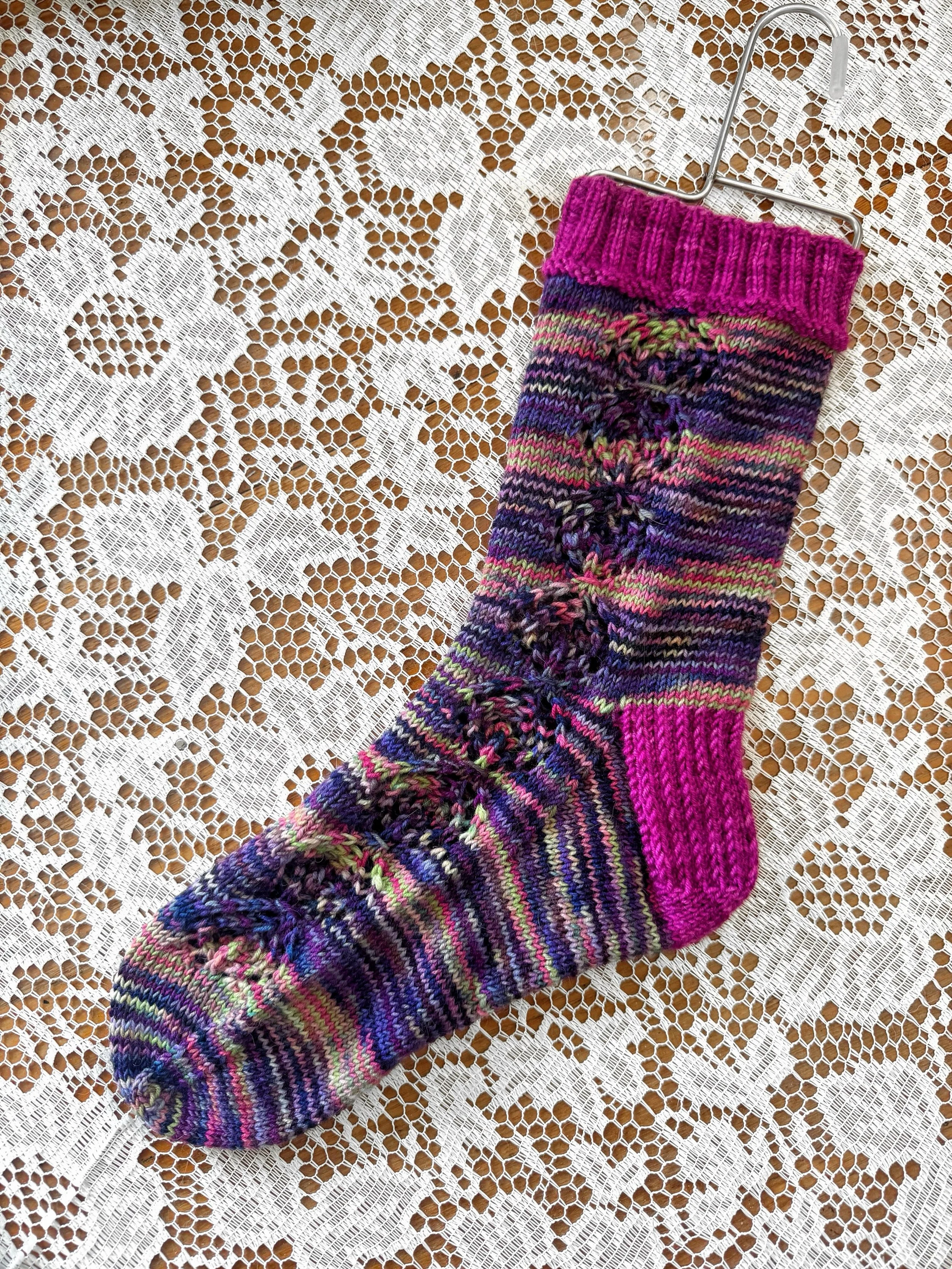 I did it. I finished three socks for #sockweek2026. And I&rsquo;m tired. 

This third sock uses the #sockweek exclusive &ldquo;Petal Party&rdquo; set yarn from @forbiddenfiberco and features yet another pattern from @bryonybears - Moonstruck Socks. 
