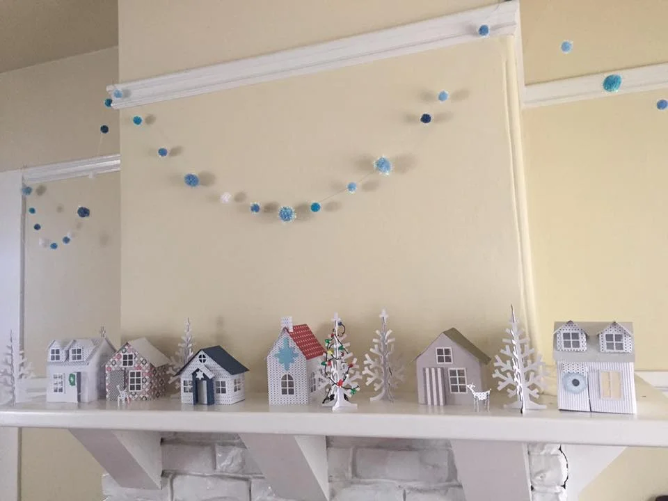This is the adorable Christmas village on my friend Katy's mantle because she is not dead inside. Also, I stole this picture from Facebook without her permission. That's right. No Christmas spirit, also a criminal. That's me. 