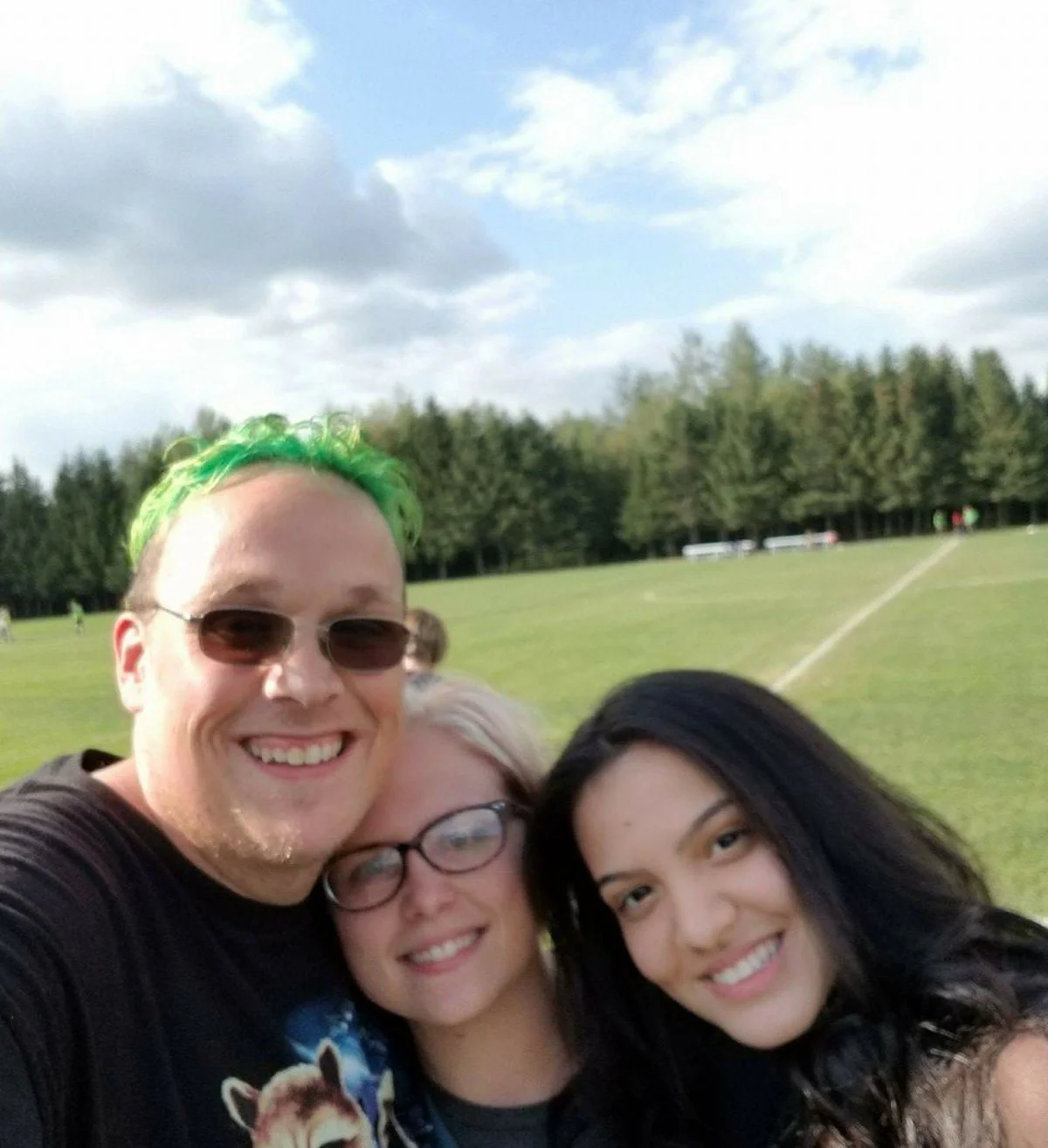 Leticia com sua "host family".