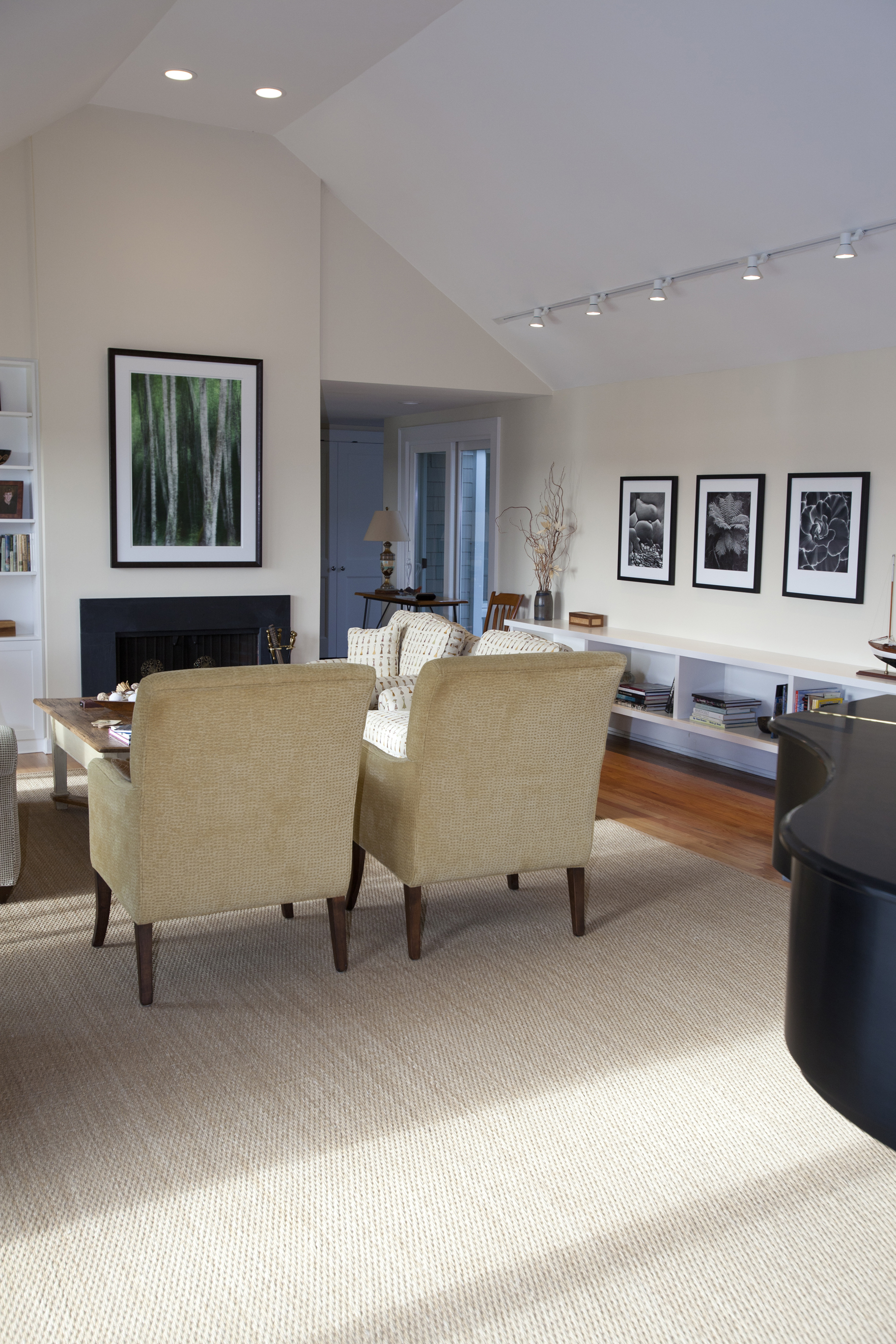 For higher ceilings, choose a large vertical or square piece to best fill the area. Hang 6-8 inches above the fireplace so that the eye is drawn to the artwork and fireplace together.