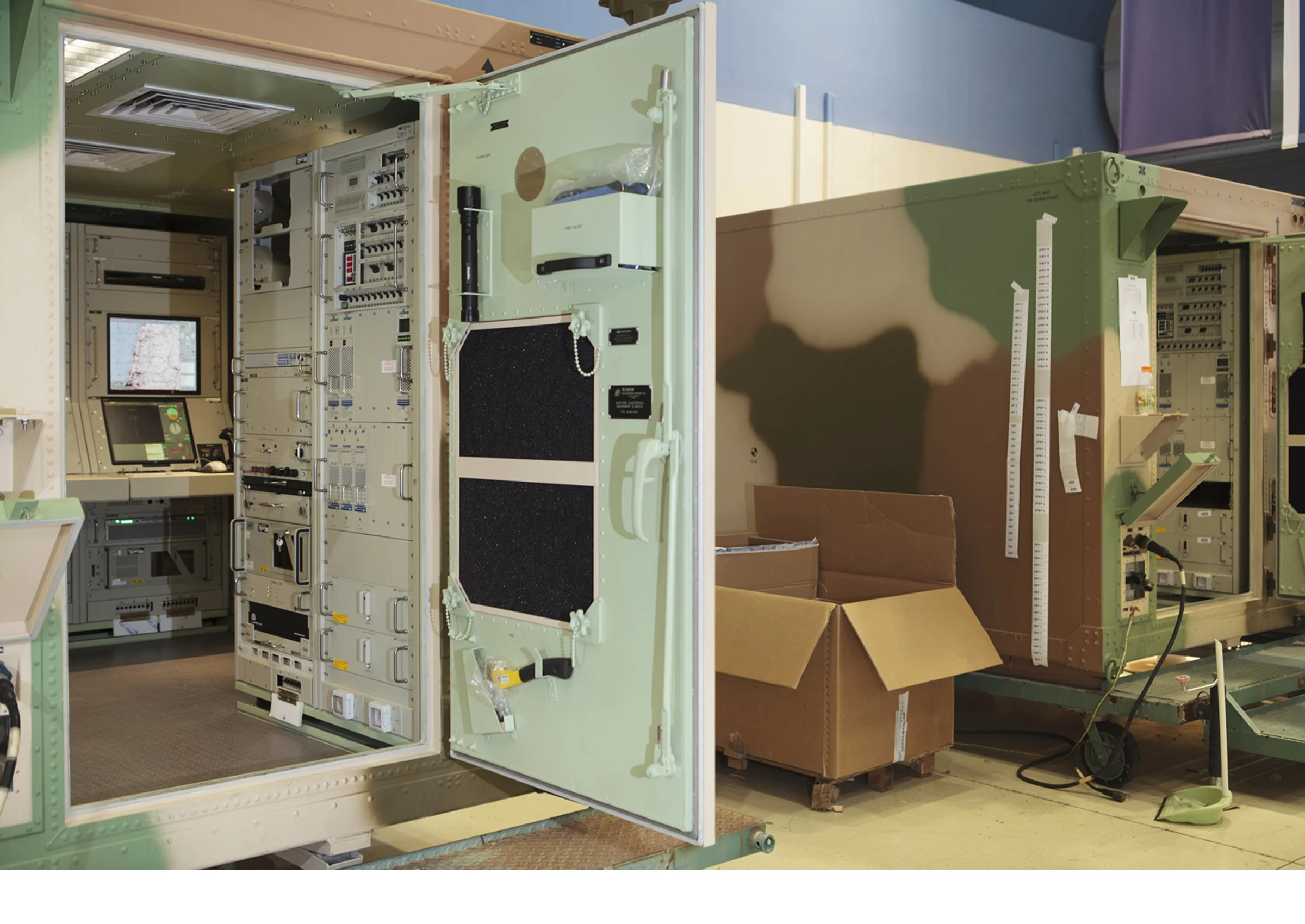 Near Airport City, Israel Ground control stations used to pilot large drones, built inside of camouflaged shipping containers at IAI’s main production facility.