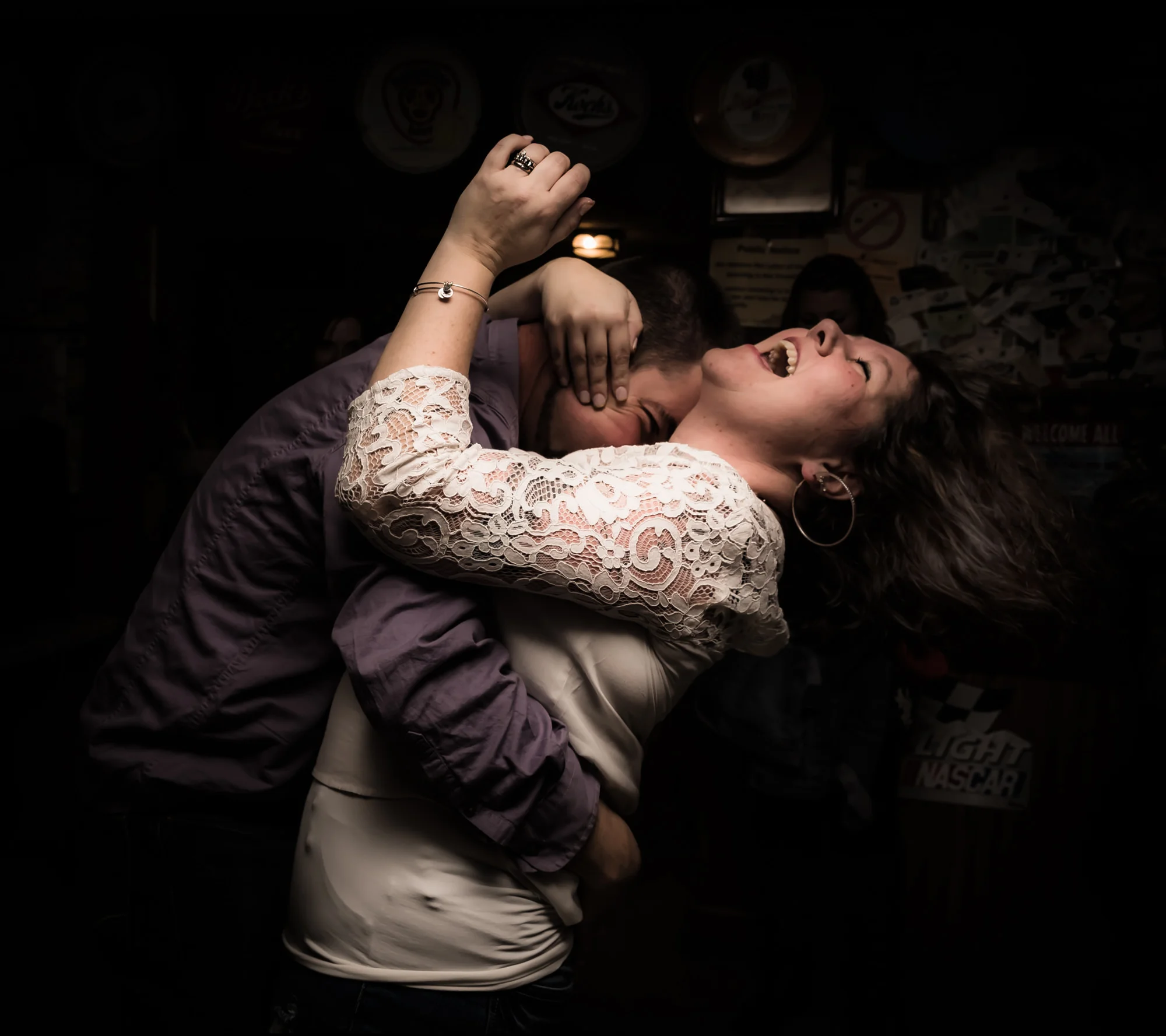Couple embracing and laughing portrait Walter Sheehey Photography Watertown, NY