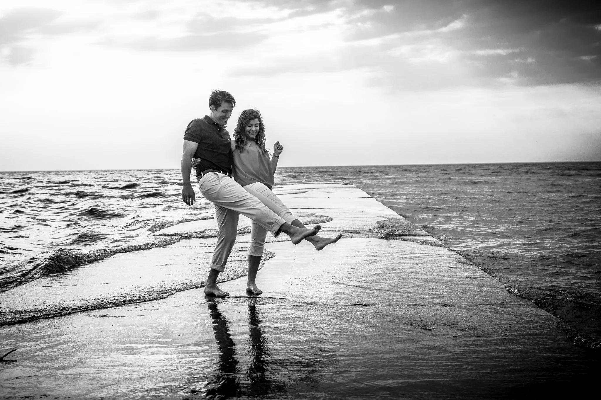 Couple on beach walking portrait Walter Sheehey Photography Watertown, NY