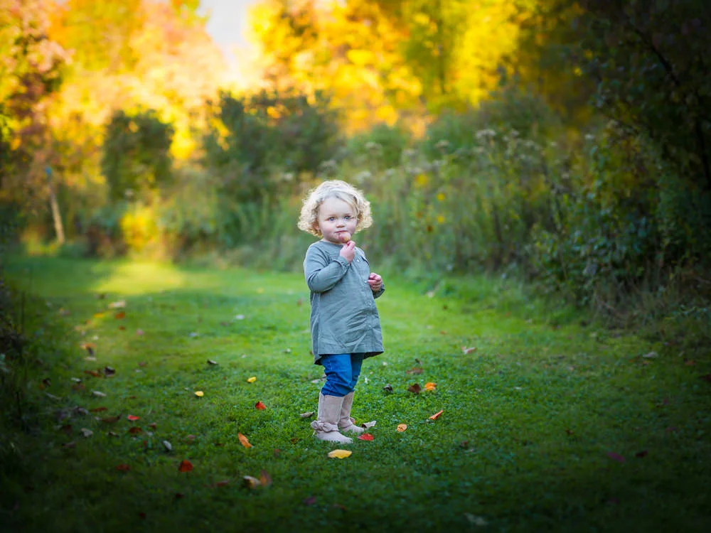 Blonde girl standing in leaves portrait Walter Sheehey Photography Watertown, NY