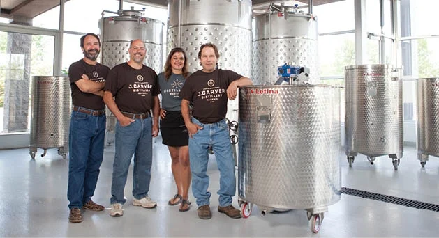 Bill Miller, Dan Niesen, Gina Holman, and Matt Miller of J. Carver Distillery in Waconia. PHOTO BY: AMANDA GAHLER