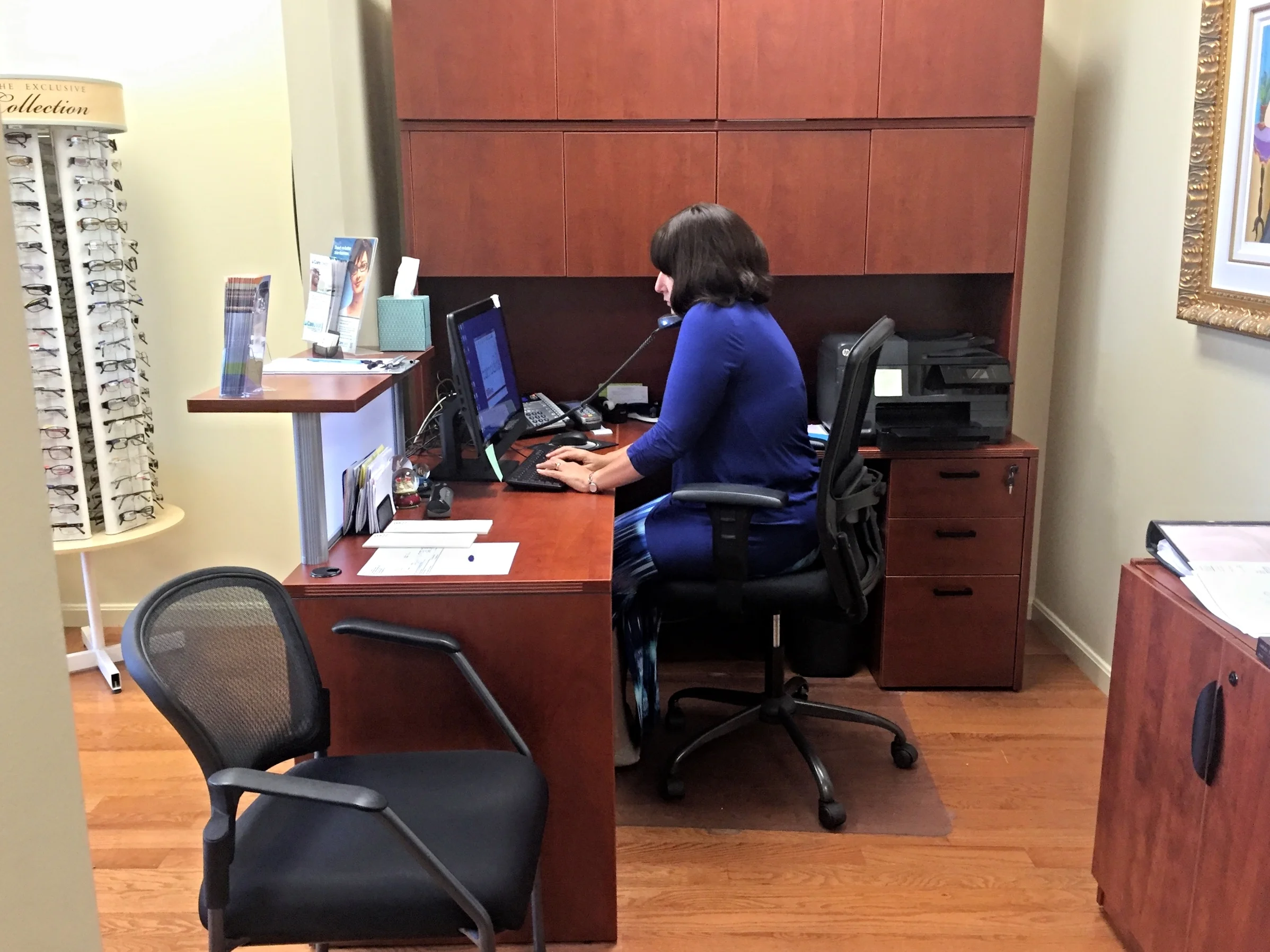 front desk on phone.jpg