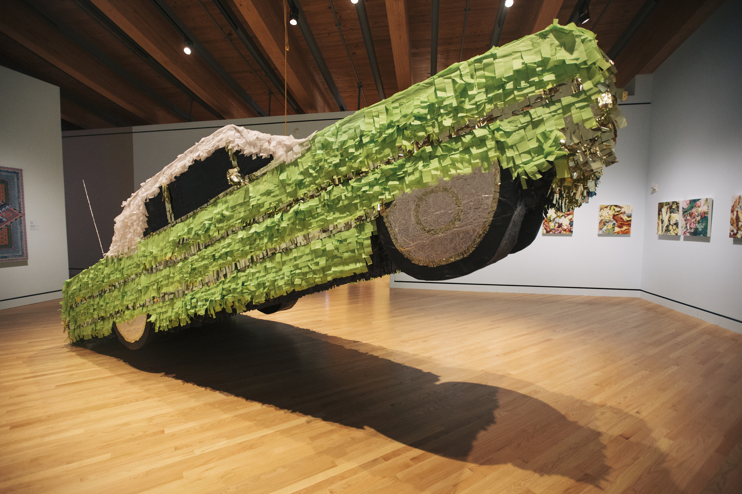 Lowrider Piñata . 2014. Cardboard, paper and glue. 5'x19.5'x6.5' Photo: Mikayla Whitmore