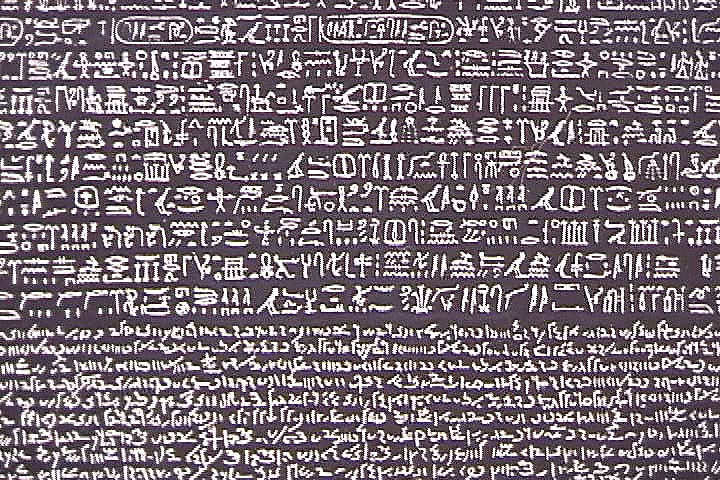A section from the Rosetta Stone. Compare this with the backdrop behind Starrett above.