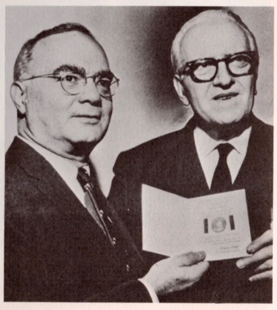 A photo of Julian Wolff giving Starrett his two-shilling award. Taken from The Last Bookman , edited by Peter Ruber.