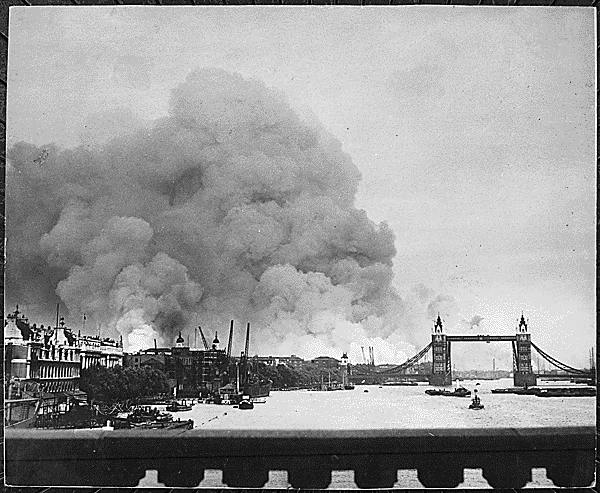 A photo of fires burning the day after a bombing. From the National Archives.