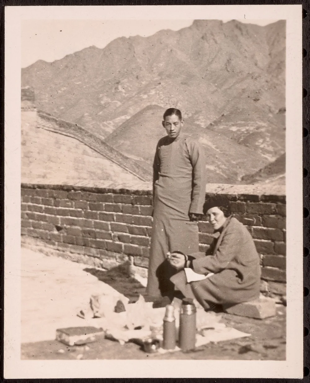 I'm going to guess that this is a lunch on the great Wall, with Ray and a local resident, perhaps a guide. 