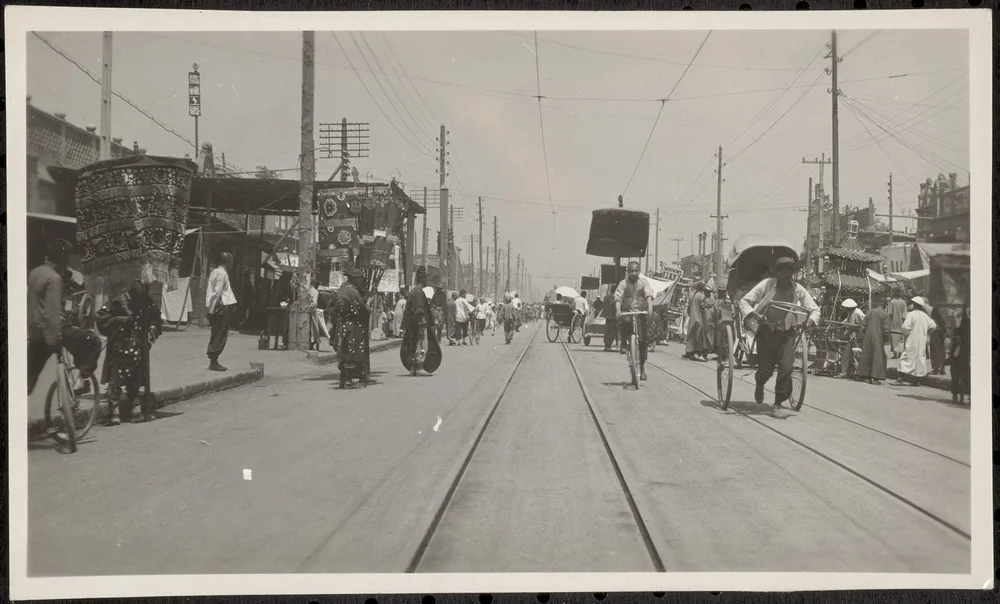 This appears to be a view of Hatamen Street in Peking. 
