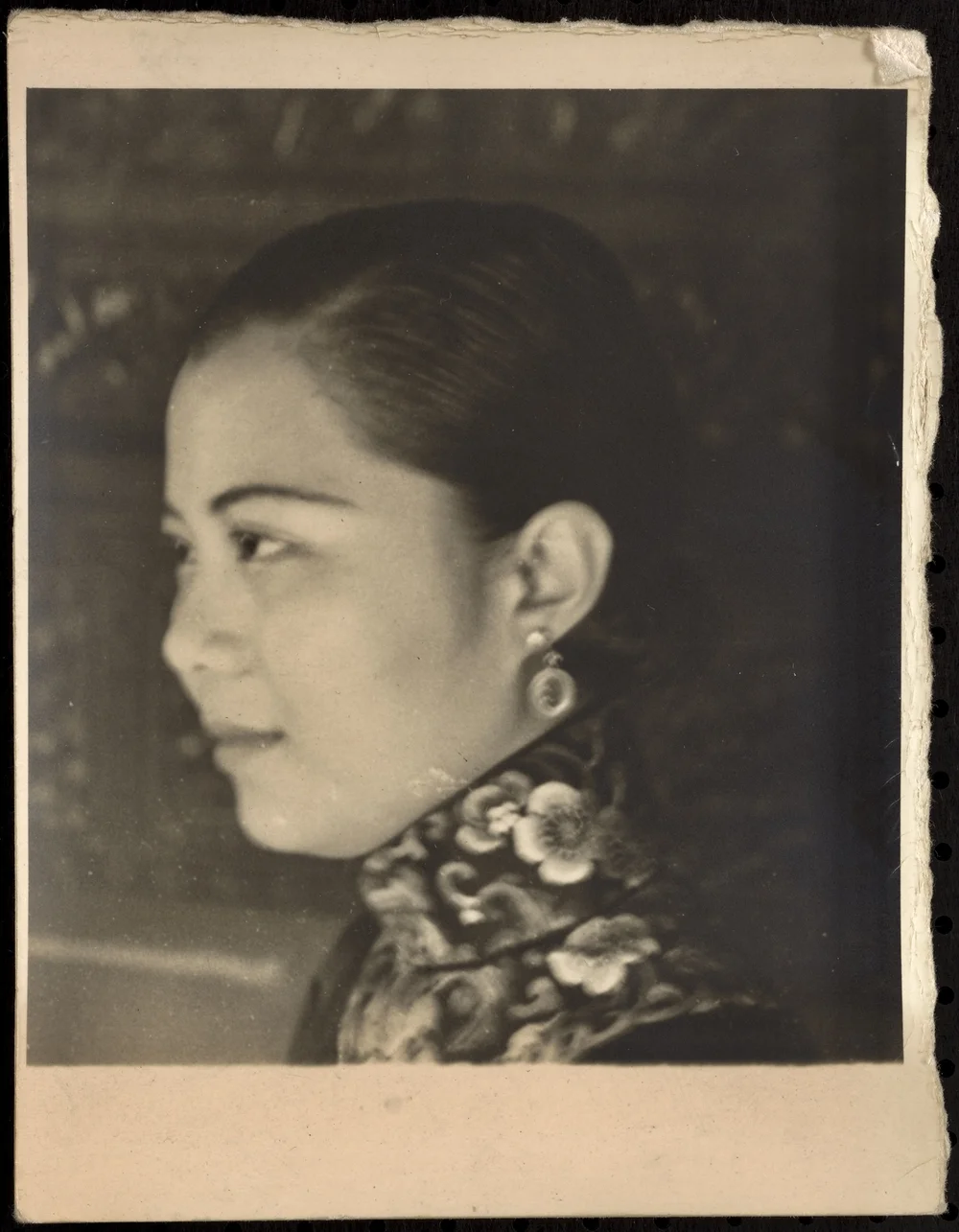 I believe this is Yi Ying, Starrett's guide in Peking. 