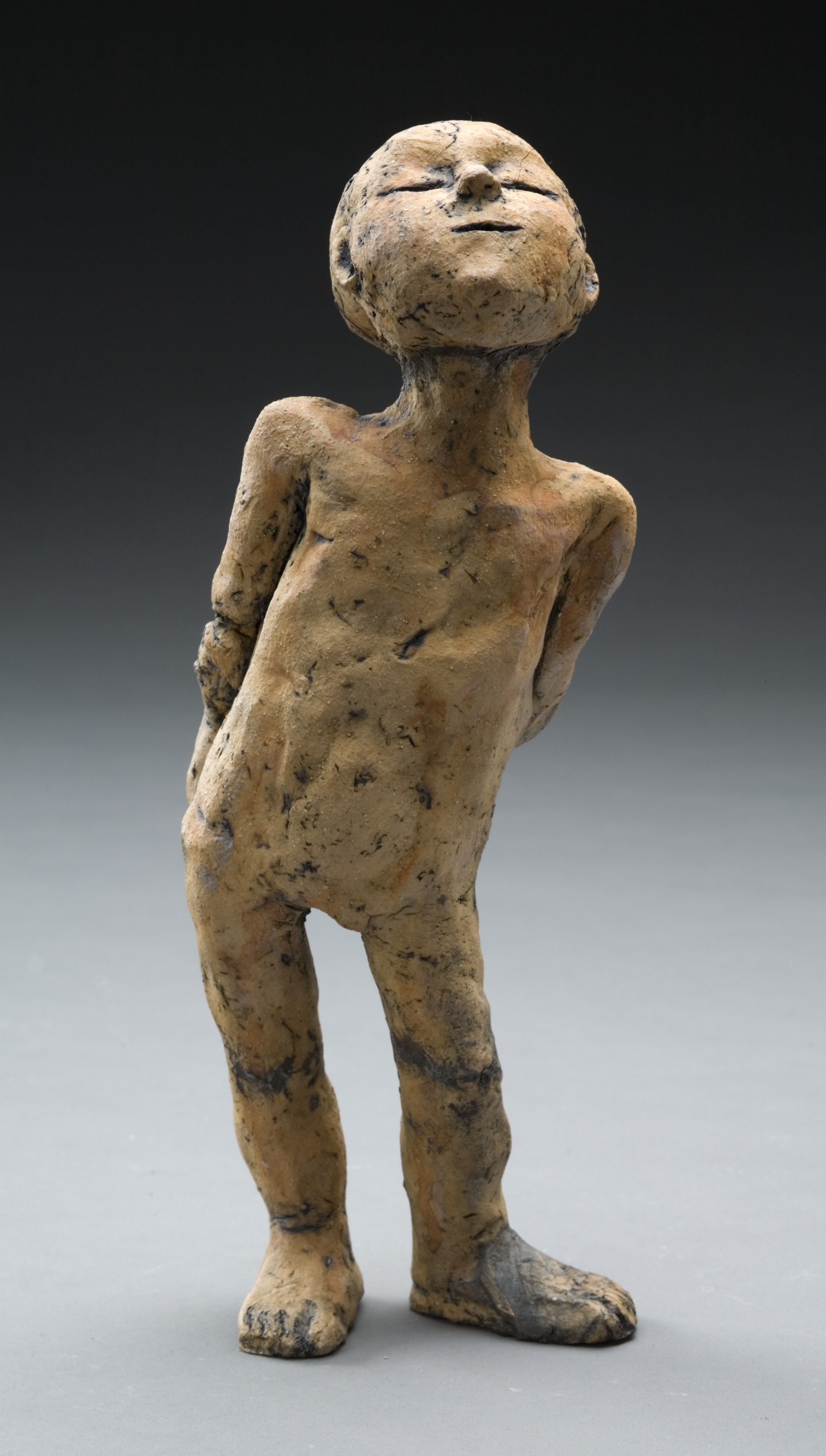 Boy sculpture looking up.jpg