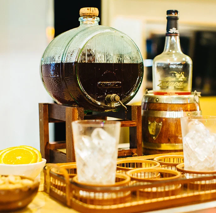 Rum barrel dispenser