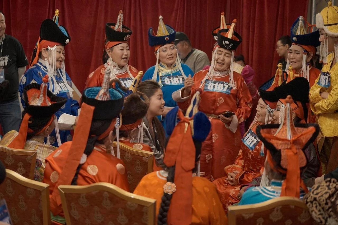 A group of people in traditional Mongolian attire at the Mongolia Got Talent Show. Film Mongolia. Filming in Mongolia. Producer in Mongolia. Film Production Service in Mongolia. Fixer Service Mongolia.
