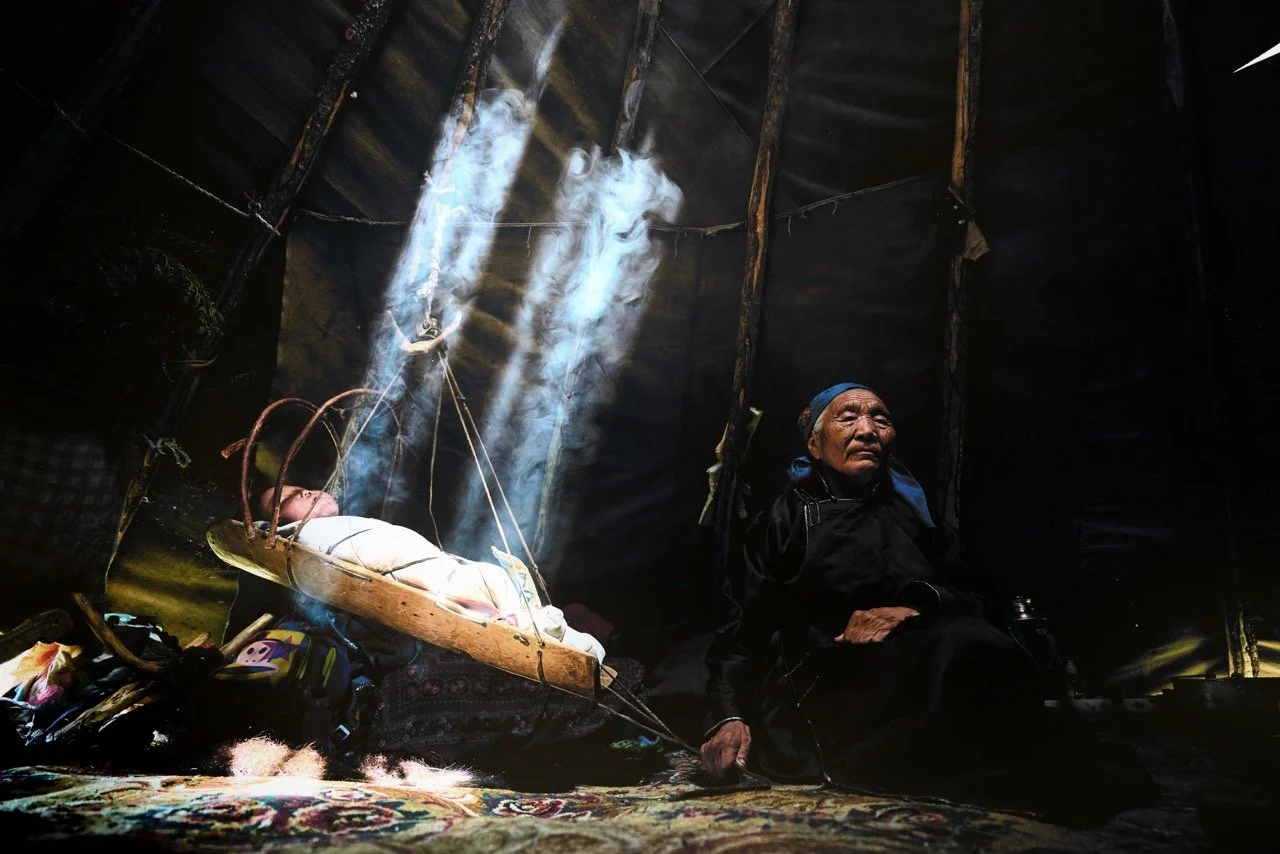 Reindeer People Tepee and traditional baby cradle in West Taiga, Mongolia. Film Mongolia. Filming in Mongolia. Producer in Mongolia. Film Production Service in Mongolia. Fixer Service Mongolia.
