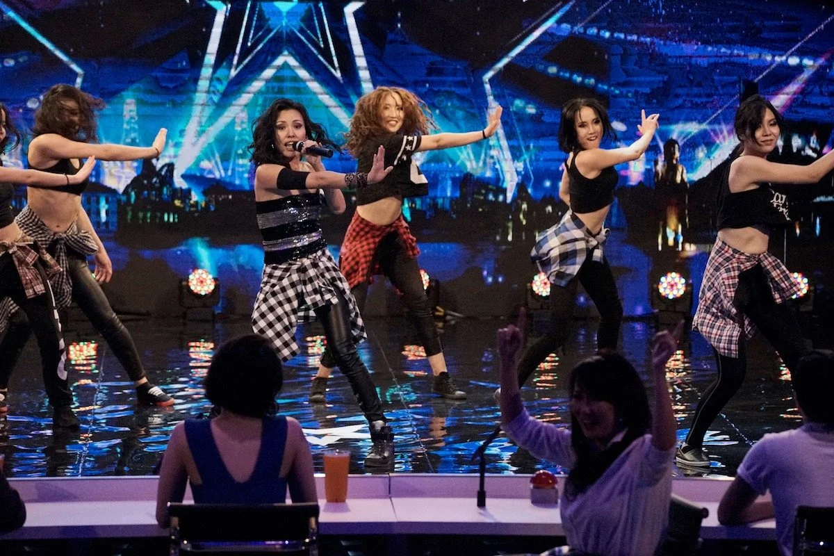 Dance group performing on stage with judges watching at the Mongolia Got Talent Show. Film Mongolia. Filming in Mongolia. Producer in Mongolia. Film Production Service in Mongolia. Fixer Service Mongolia.