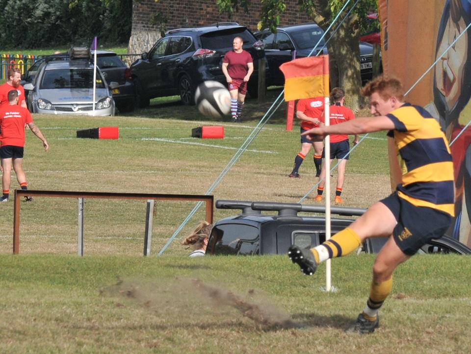 Dom Saunders knocks over a conversion. Photo Credit: Graham Henley