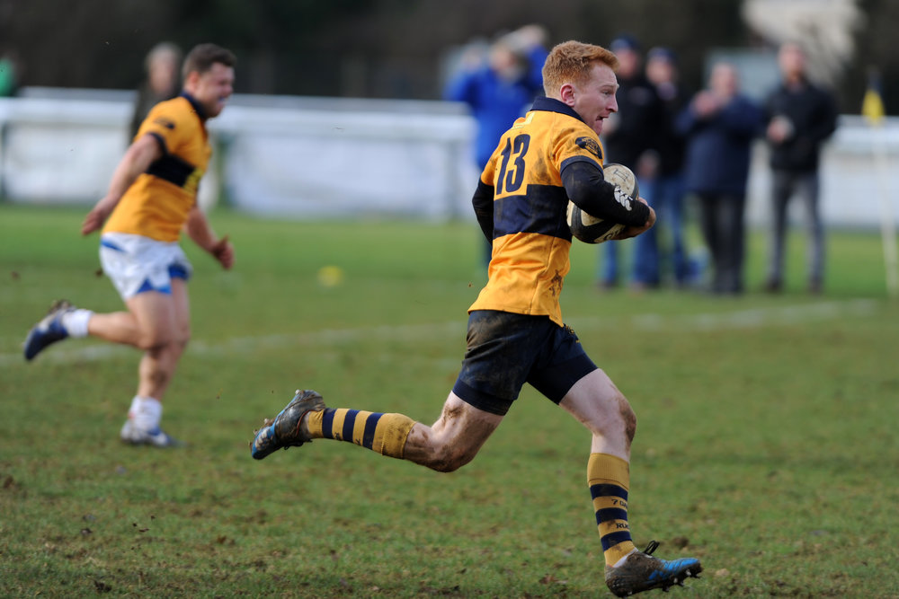 Catch me if you can! Centre and captain Jack Curnow races away to score Oaks first try. Photo Credit: David Purday