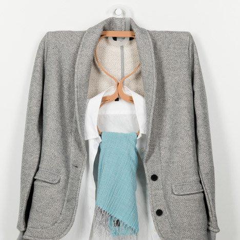 Coat, t-shirt, scarf; a whole outfit embraced by this cleverly structured design. 