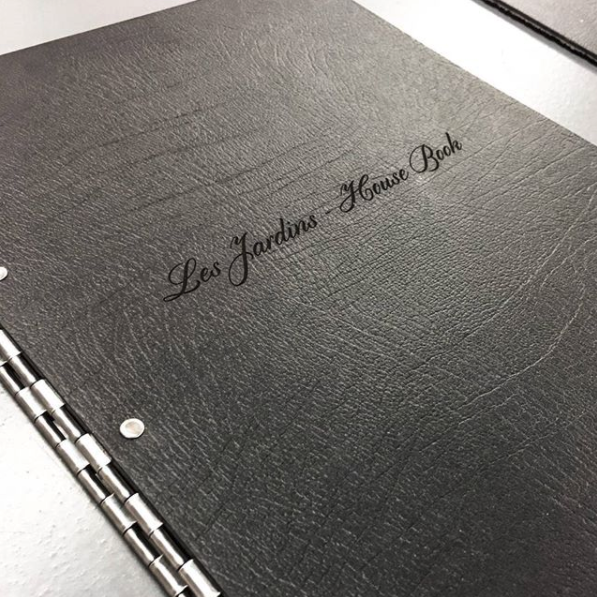 name engraving on an A3 portrait leather-bound personalised portfolio with script font laser engraving