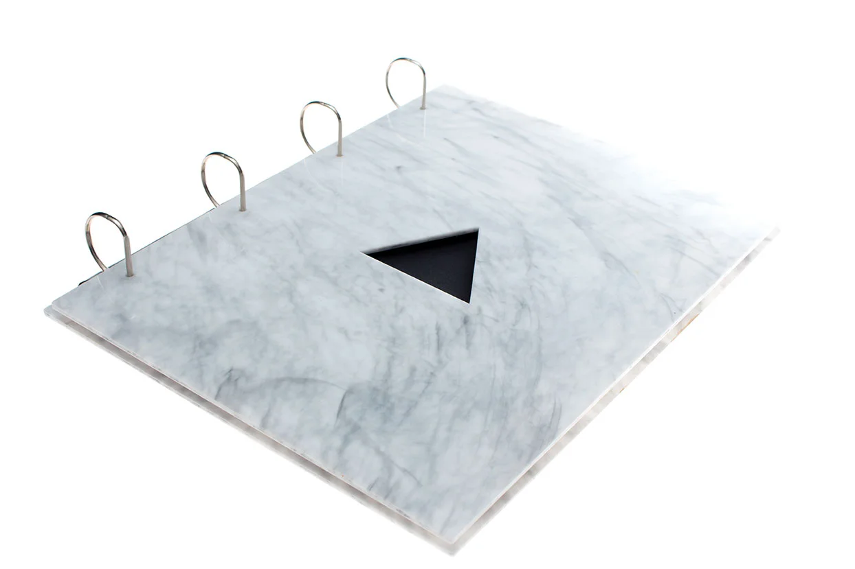 A4 portrait portfolio folder made of 3mm marble design acrylic perspex with a cut out geometric triangle to show your first page