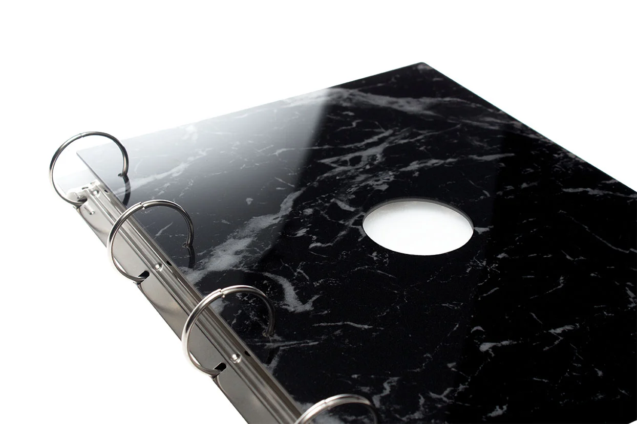 black marble effect portfolio in A4 portrait customised with a circular shape cut out