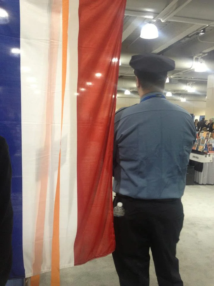 A cop keeping an eye on things at the Boston AWP, 2013