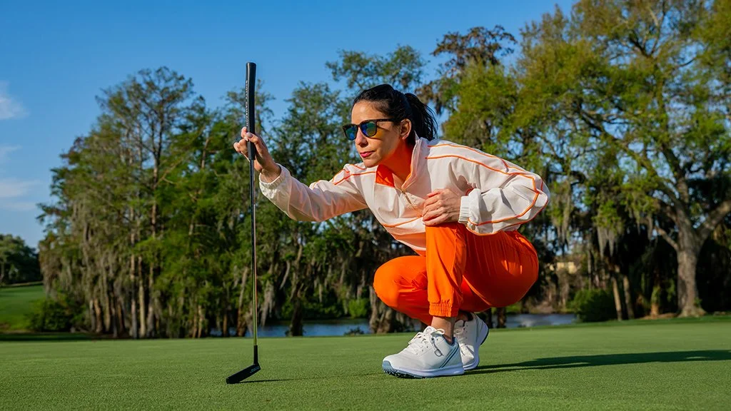female-golfer-reading-putt-green-lifestyle-golf-shoot.JPG