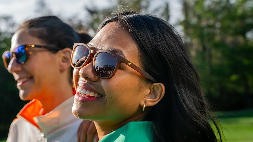 women-golfers-sunglasses-lifestyle-portrait-golf-course.JPG