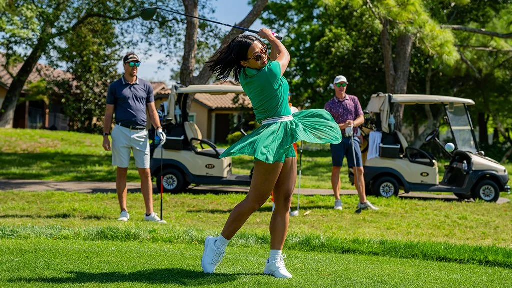 female-golfer-swing-action-lifestyle-golf-course.JPG