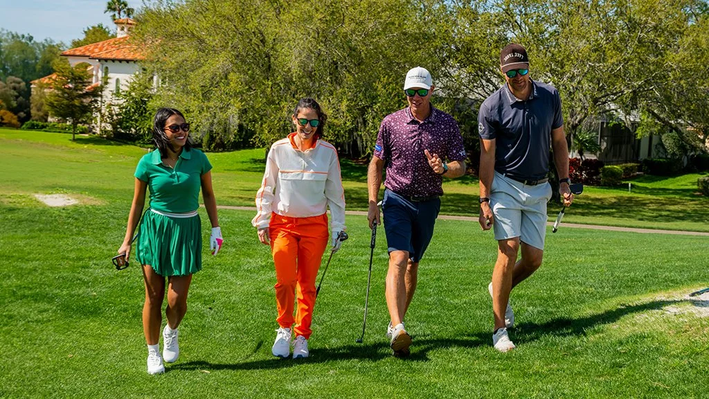geno-bonnalie-austin-gaugert-golfers-walking-course-lifestyle.JPG