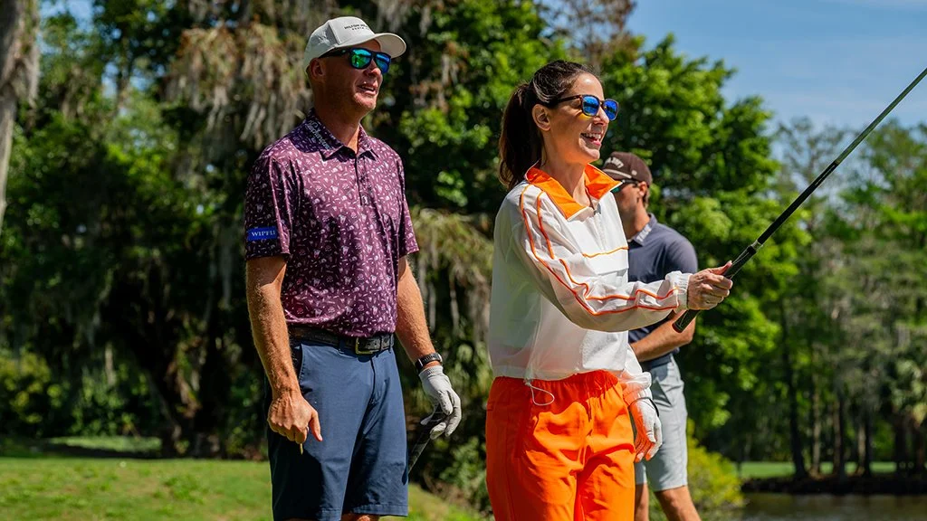 geno-bonnalie-golf-lifestyle-group-watching-shot-golf-course.JPG