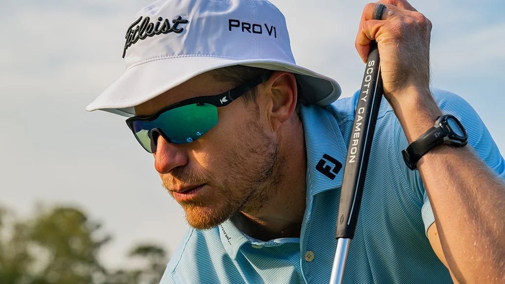 PGA Tour golfer Peter Malnati wearing sunglasses during golf lifestyle photoshoot