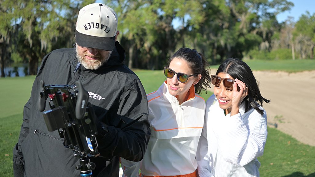 photographer-reviewing-images-with-talent-golf-shoot.JPG