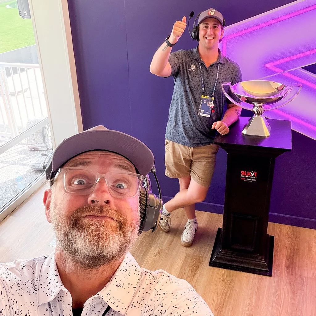 Michael LeGrand and a fellow video production crew member with the FedExCup trophy at East Lake Golf Club.
