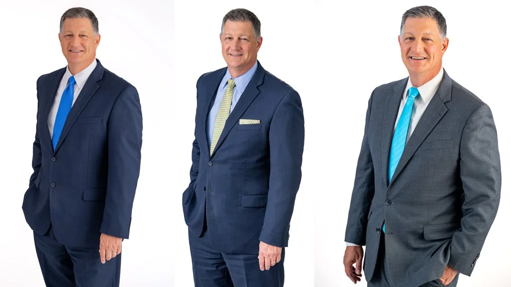 Three portraits of Kent Justice over multiple years, showing consistent corporate headshot style with variations in wardrobe and expression.