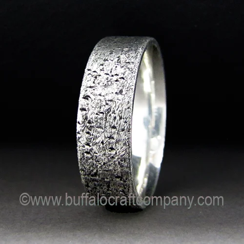  0
0
1
78
445
Buffalo Craft Company
3
1
522
14.0
Normal
0
false
false
false
EN-US
JA
X-NONE
/* Style Definitions */
table.MsoNormalTable
{mso-style-name:"Table Normal";
mso-tstyle-rowband-size:0;
mso-tstyle-colband-size:0;
mso-style-noshow:yes;
mso-style-priority:99;
mso-style-parent:"";
mso-padding-alt:0in 5.4pt 0in 5.4pt;
mso-para-margin:0in;
mso-para-margin-bottom:.0001pt;
mso-pagination:widow-orphan;
font-size:10.0pt;
font-family:Cambria;}
Our Mastermind wedding band is fabricated to be rough, rustic, and distressed. A perfect fit in a world where form meets function, a new scuff or scratch only adds to the beauty of this ring. Available widths; 5, 6, 7, 8 or 9mm.