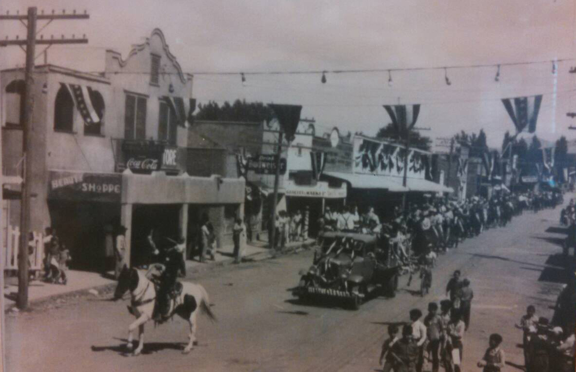  Granado Street parade. Date estimated to be before 1945. Original source unknown. Possibly owned by Tularosa Historic Society. Photography taken from copy at United County Real Estate Properties.&nbsp; 