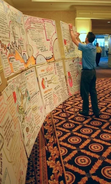 Drew builds a wall of images.